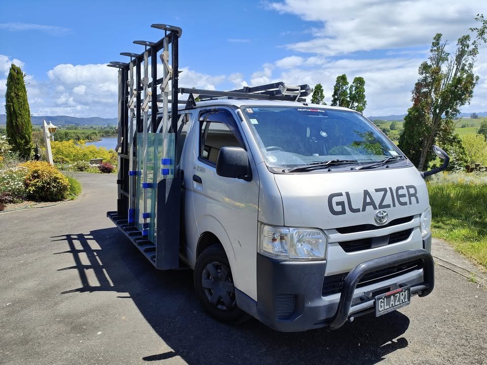 Jake The Glass Guy work van loaded with glass on a rural Te Awamutu driveway